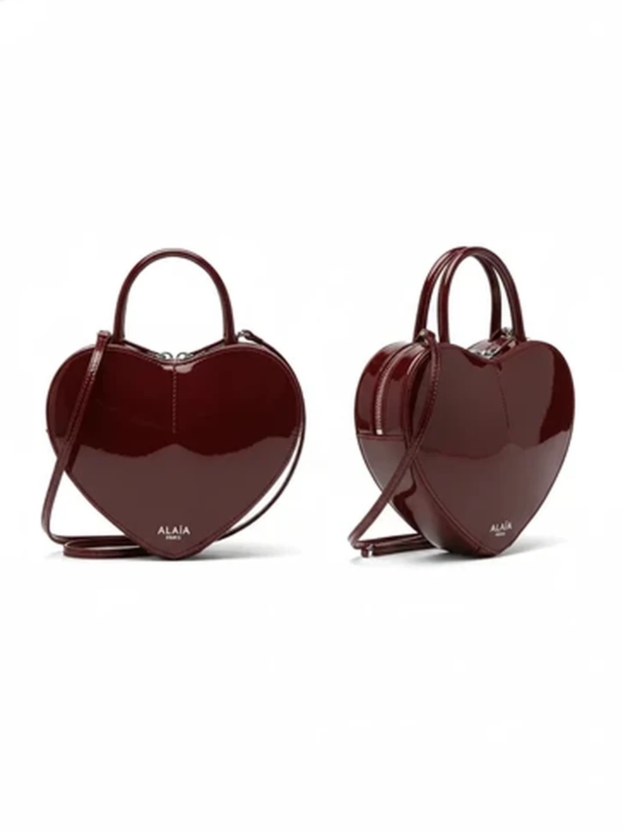 Женская лаковая сумка Alaïa в форме сердца бордового цвета